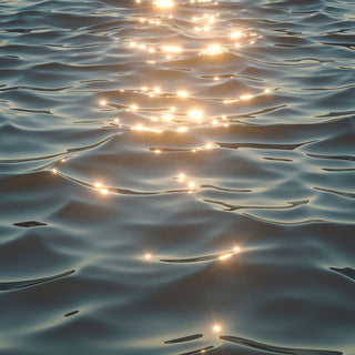 Water with sun gleaming off small waves