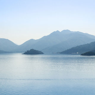Tall mountains and large body of water